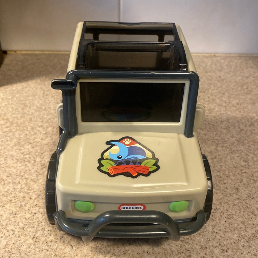 The Little Tikes Big Adventures Binocular Searching Safari SUV is a toy vehicle
